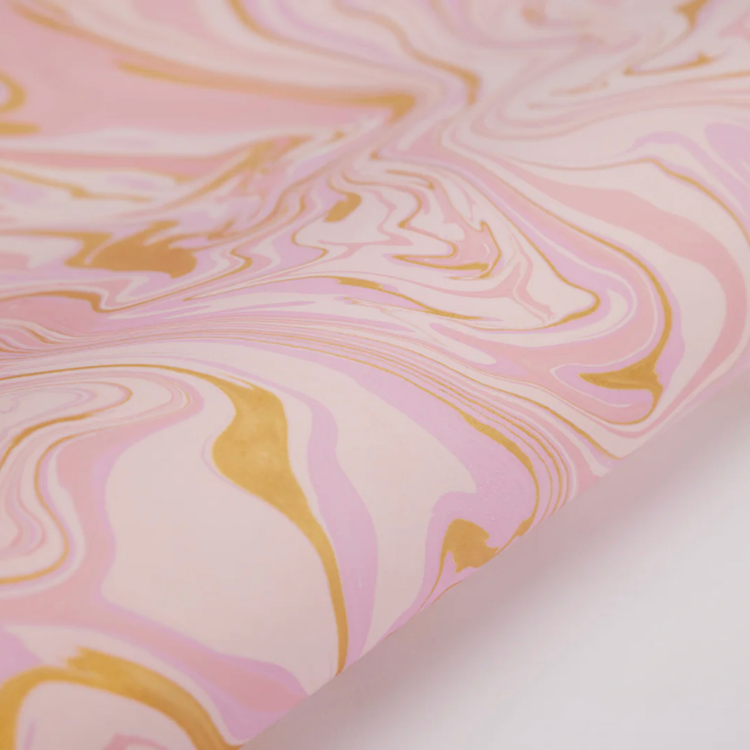 The Voyage Dubai - These paper sheets are each individually hand marbled by skilled artisans on to luxurious cotton handmade papers. They are not screen printed or digitally mass-produced.
The beautiful free-flowing hand marbled designs are suitable for any occasion and are also popular choice for art and craft, origami and bookbinding.