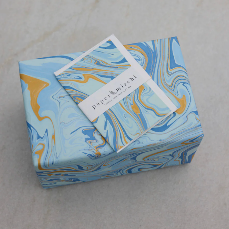The Voyage Dubai - These paper sheets are each individually hand marbled by skilled artisans on to luxurious cotton handmade papers. They are not screen printed or digitally mass-produced.
The beautiful free-flowing hand marbled designs are suitable for any occasion and are also popular choice for art and craft, origami and bookbinding.