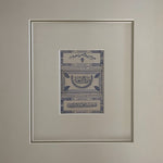 The Voyage Dubai - Vintage 1920s Ottoman Cigarette Rolling Paper.  Framed with neutral mat and classic black and gold frame. Presented behind museum-grade glass to protect the artwork and eliminate reflections. 