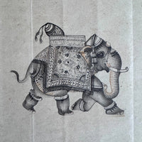 Original miniature painting of a decorated elephant in a patterned blanket and anklets, painted in dots and fine line on old paper
