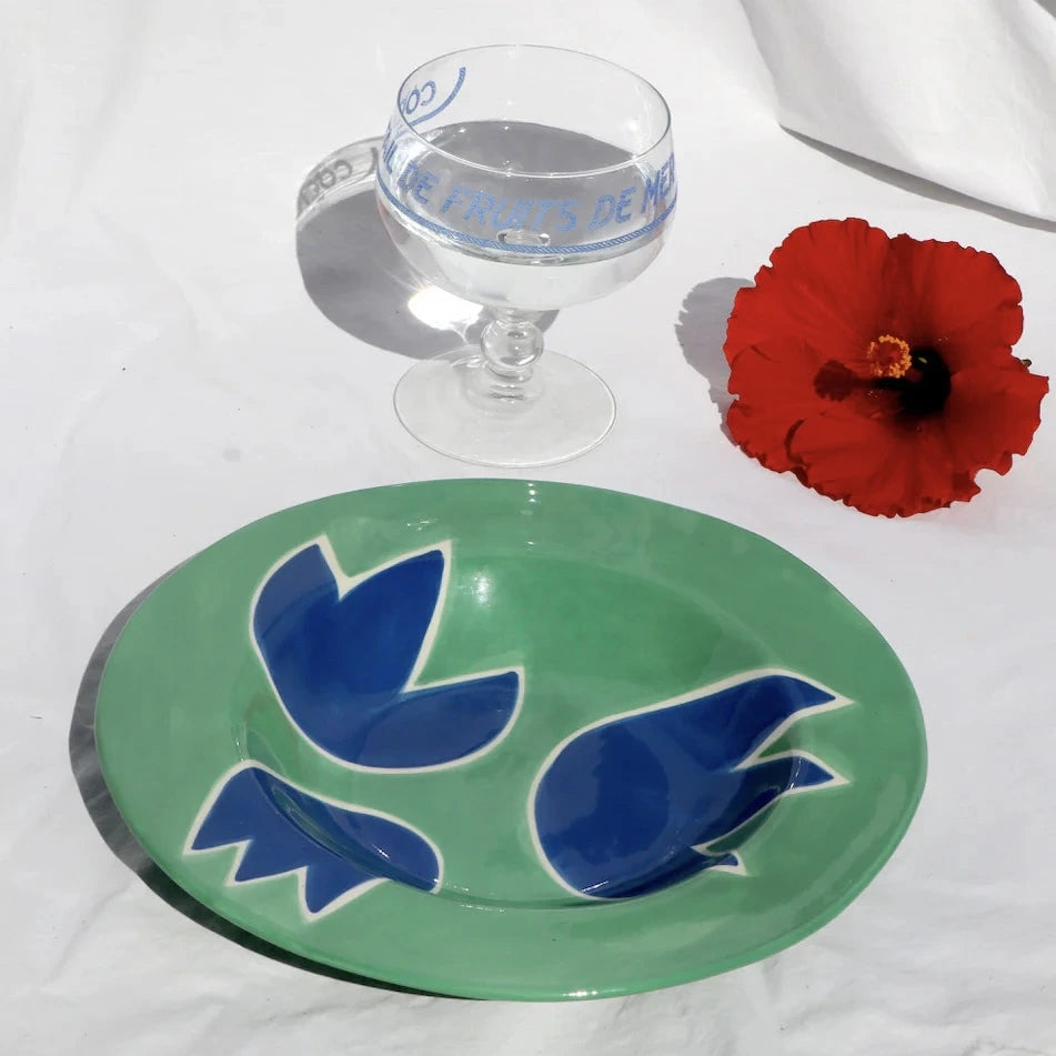 The Voyage Dubai - Blue & Green Tulip Plate - Hand-painted stoneware dinner plate by French designer Laetitia Rouget. Food and dishwasher safe. Made by hand in Portugal. 