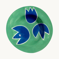 The Voyage Dubai - Blue & Green Tulip Plate - Hand-painted stoneware dinner plate by French designer Laetitia Rouget. Food and dishwasher safe. Made by hand in Portugal. 