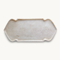 Top view of the narrow cream Makrana marble tray with notched corners
