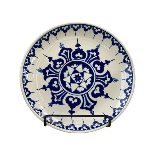 The Voyage Dubai - One of a kind, hand-painted Iznik ceramic plate from Turkey featuring a bold blue and white geometric design. 