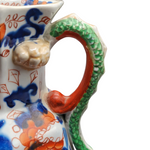 The Voyage Dubai - Antique Mason's Ironstone Imari Jug  A rare, antique Mason's Ironstone Hydra Jug with a superb serpent handle in a lovely Imari Pattern.  The jug has the octagonal "hydra" shape with a notched snake handle and is decorated in distinctive cobalt blue and floral pattern, which is one of Mason's well known chinoiserie patterns, using bold hand painted enamels of cobalt blue, green and burnt orange all in various shades.