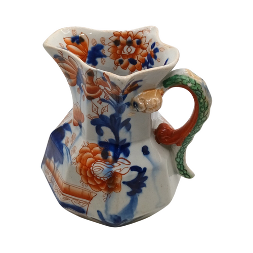 The Voyage Dubai - Antique Mason's Ironstone Imari Jug  A rare, antique Mason's Ironstone Hydra Jug with a superb serpent handle in a lovely Imari Pattern.  The jug has the octagonal "hydra" shape with a notched snake handle and is decorated in distinctive cobalt blue and floral pattern, which is one of Mason's well known chinoiserie patterns, using bold hand painted enamels of cobalt blue, green and burnt orange all in various shades and possibly over a light printed outline.