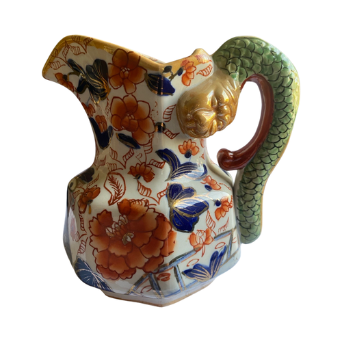 The Voyage Dubai - Antique Mason's Ironstone Imari Jug A rare, antique Mason's Ironstone Hydra Jug with a superb serpent handle in a lovely Imari Pattern. The jug has the octagonal "hydra" shape with a notched snake handle and is decorated in distinctive cobalt blue and floral pattern, which is one of Mason's well known chinoiserie patterns, using bold hand painted enamels of cobalt blue, green and burnt orange all in various shades.