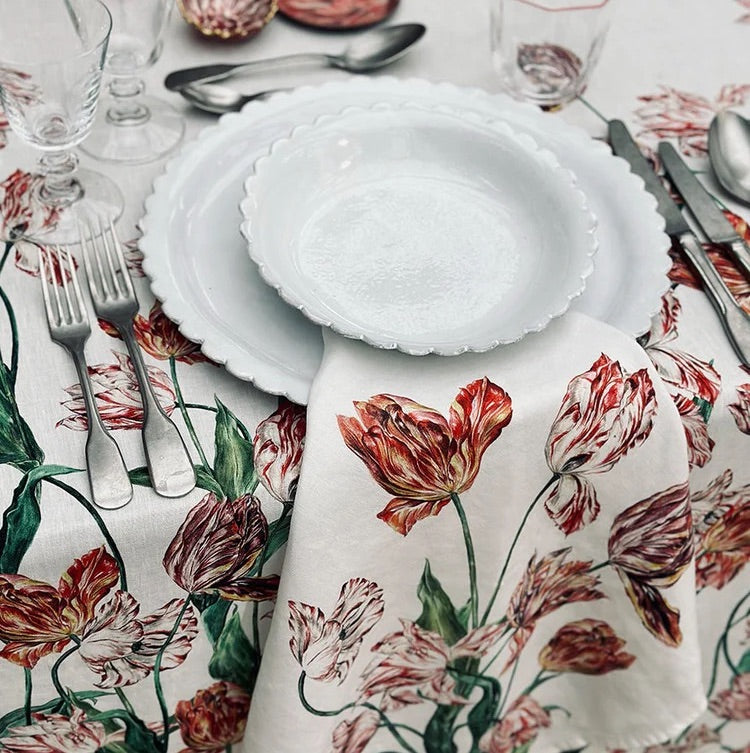 The Voyage Dubai - S&amp;B Tulip Linen Napkins in Red & Pink- Set of Two - Tulipmania takes hold all over again… With rich, complex colours and elaborately curved and crimped petals that give each flower a distinctive character, this print explores the intriguing nature of the Tulip, a flower that has continued to beguile with its beauty, throughout the centuries.