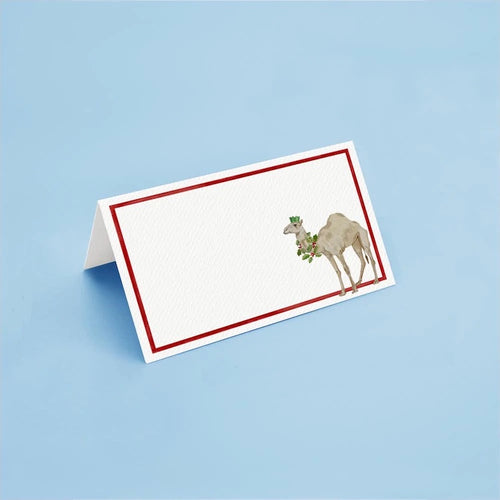 The Voyage Dubai - Christmas Camel Place Cards by Aquarela  The perfect finishing touch to the holiday table.  Originally illustrated in watercolour by Portuguese artist India who draws inspiration from her home in Comporta and summers spent in the Bahamas.  Printed on luxury 200gsm textured paper.  Size: 10cm x 8cm   Sold in packs of twelve.