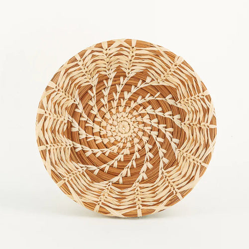 The Voyage Dubai - Handmade and designed by Mayan Hands artisan partners in Sololá, Guatemala the Catarina basket is handwoven from raffia and pine needles with a centre spiral design. Great as a little vide-poche by the front door for keys or on a bedside table for jewellery. It also makes a lovely display piece.  Handmade and fair trade.