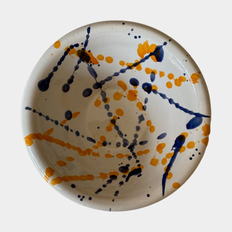 The Voyage Dubai - Splatter Condiment Bowl (Zingla) in Blue/Orange  A wonderful addition to the tablescape in the distinctive and traditional Mediterranean 'splatter' pattern.  Beautiful and versatile, adding charm and character, the zingla bowl is a staple in every Maltese household, traditionally used for myriad domestic purposes. Our bowls are the perfect size for serving nuts, chips and dips.