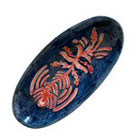 The Voyage Dubai - A wonderful, stylish addition to the table, the small Peacock Oval Serving Plate is sure to add a luxurious feel to any dining table. A standout piece, hand painted with a striking peacock pattern in deep blues and pinks. Perfect for special occasions or everyday use.