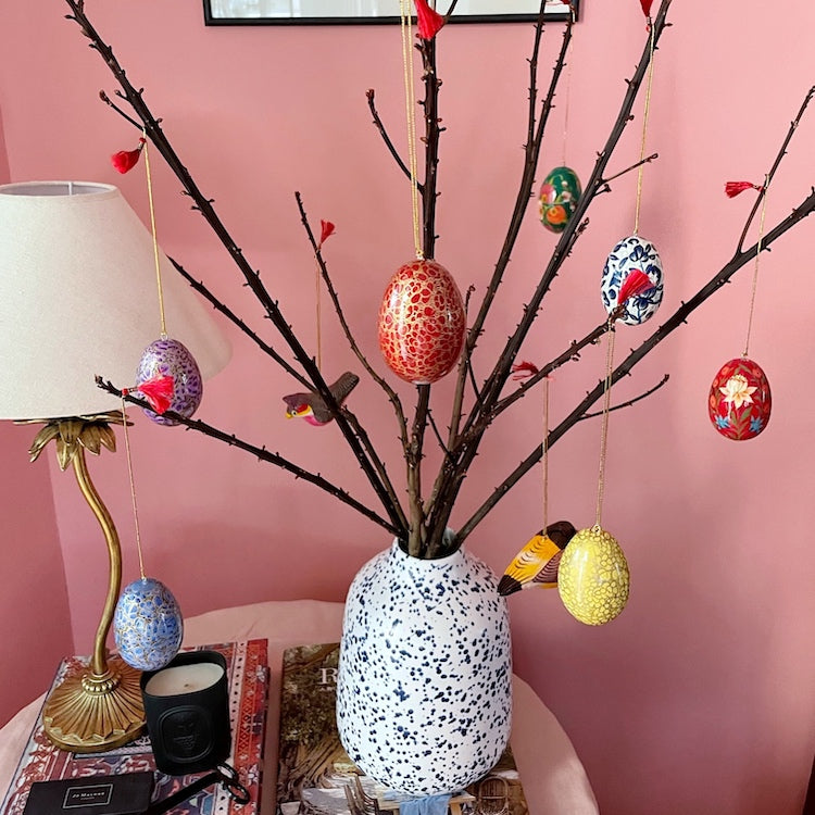 The Voyage Dubai - These decorative Easter eggs are handcrafted and painted by skilled artisans in beautiful kashmiri designs.  Made from willow wood and paper mache and individually painted in an assortment of rich, vibrant colours, they come ready with string for hanging and are finished with a gold tassel adding the final touch.  The perfect addition to your Easter tree or table. 