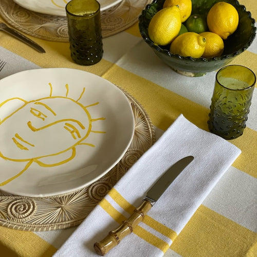 The Voyage Dubai - Lunch in Tangier Thick Stripe Tablecloth - Buttercup Made from a wonderfully soft yet highly durable handwoven cotton, the Lunch in Tangier tablecloth is perfect for everyday use and equally stunning dressed up for a special occasion. 