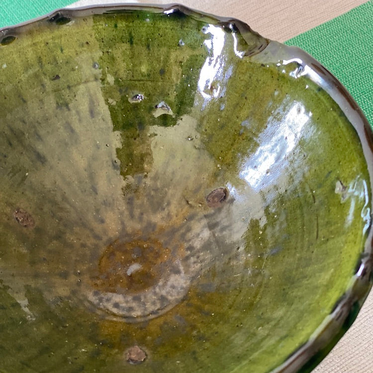 The Voyage Dubai - Tamegroute Pottery Bowl - Large Our range of Tamegroute pottery is designed to be cherished. Crafted from clay and natural raw materials native to the region, each piece is organically shaped without moulds in a traditional method passed down from generation to generation. Both practical and stylish, use the bowls for serving snacks and dips or simply as a decorative piece for display.