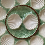 The Voyage Dubai - Large vintage French Oyster Serving Plate in the green and white basket weave design.  This is a lovely majolica oyster plate with 12 scalloped oyster compartments, perfect for a party.