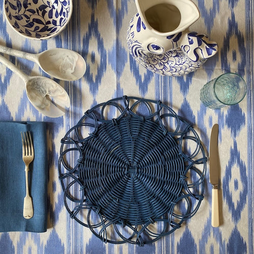 The Voyage Dubai - Available in four striking variations, our wicker placemats are handwoven by artisans in India. Use them to create a bold, layered tablescape.