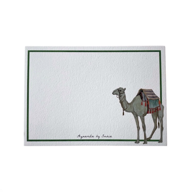 The Voyage Dubai - Camel Notecards by Aquarela  Originally illustrated in watercolour by Portuguese artist India who draws inspiration from her home in Comporta and summers spent in the Bahamas.  Printed on luxury 300gsm textured paper.  Size: A6  Sold in packs of ten without envelopes.