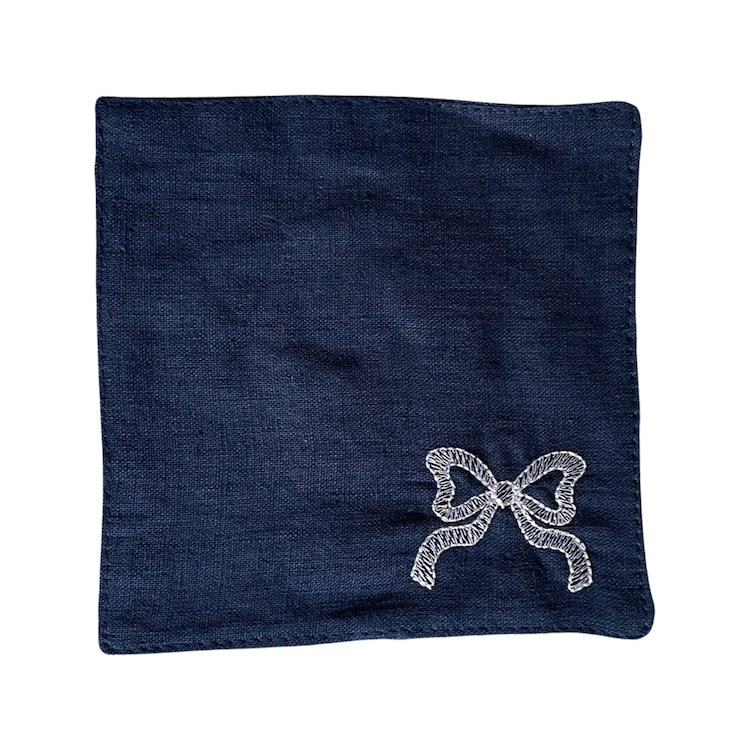 The Voyage Dubai - White Tie Cocktail Napkins in Navy A classic navy and white pairing with beautifully embroidered bow motifs. Great for any season, perfect for Christmas! Our cocktail napkins are handcrafted from 100% European linen that has been stonewashed and softened giving them a wonderful, luxurious feel. The cocktail napkins come beautifully presented making for the perfect gift.