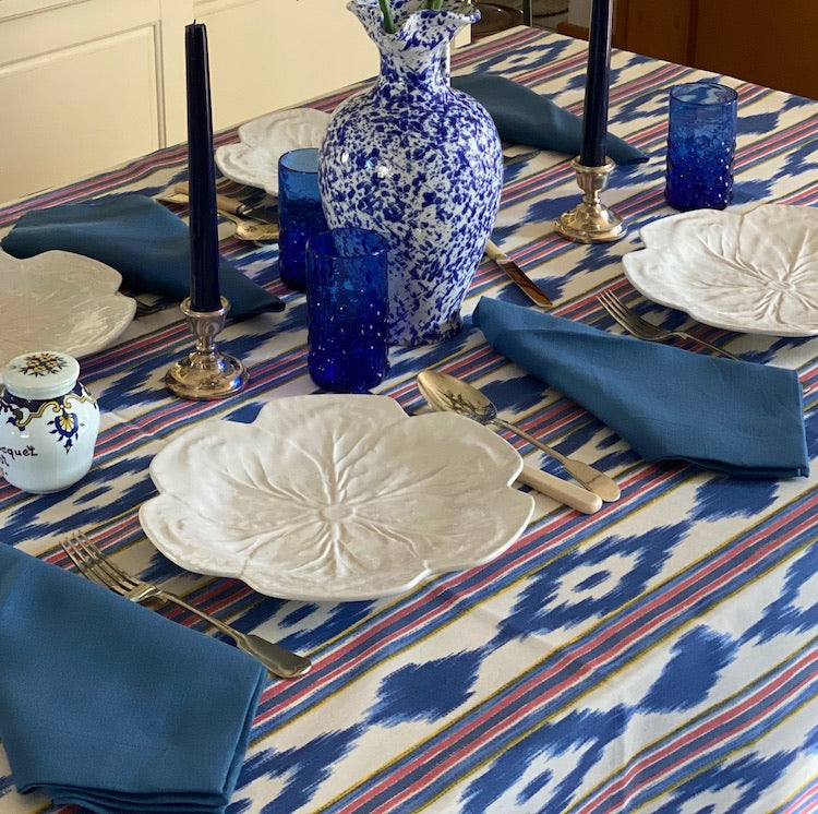 The Voyage Dubai - Mallorcan Ikat Tablecloth in Carnival  A striking cotton blend tablecloth printed in this traditional geometric motif reflective of the easy Mediterranean lifestyle. Perfect for long lunches and alfresco dining.  Origin: Spain Made by hand locally  Also available in other colours.