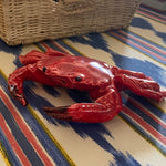A lovely decorative piece, designed to be hung on the wall or simply placed on a table or desk, these ceramic crabs are handmade in a small workshop in the centre-west of Portugal. The design reflects the style of the Caldas da Rainha ceramics, home of the famous ceramicist Bordallo Pinheiro.  Full of character, the detail and workmanship is exquisite.  Approximate measurements: 17 x 13 cm  Sold individually, the crabs come with holes for hanging. 