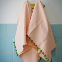 The Voyage Dubai - Made in Tangier Pom Pom Hand Towel - The sweetest little addition to every boot room, bathroom and laundry, 100% pure cotton the Pom Pom Hand Towel is available in a multitude of colours, complimented with a fringe of pom poms.