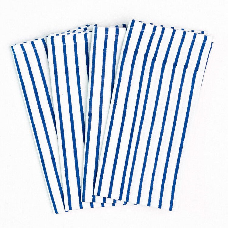 The Voyage Dubai - Classic Stripe Dinner Napkins Jodhpur Blue 100% cotton hand block printed dinner napkins Sold in set of four - beautiful blue and white design. printed by hand in Jaipur India
