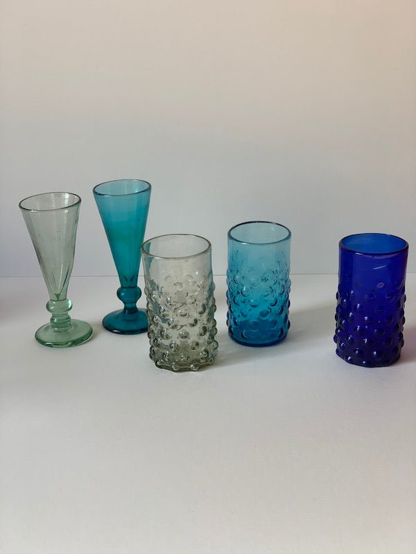 The Voyage Dubai - Handblown Syrian Recycled Bubble Tumbler (Cobalt Blue) Beautiful, whilst adding an element of fun, coloured glass is having a moment in the spotlight and we absolutely love these bubble tumblers, individually hand-crafted by talented artisans in Syria.