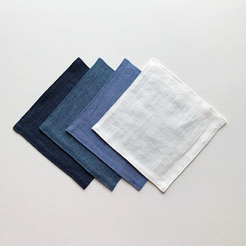 The Voyage Dubai - Linen Cocktail Napkins in Blues Set of 4. Our cocktail napkins are handcrafted from 100% European linen that has been stonewashed and softened giving them a wonderful, luxurious feel. 
